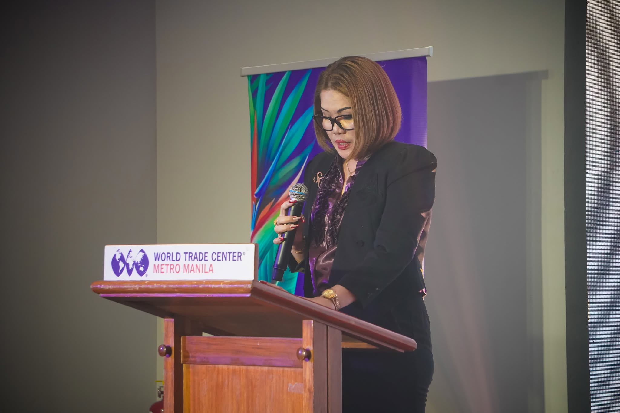 Catalina Posada, Owner and CEO speaking at World Trade Center Manila Expo