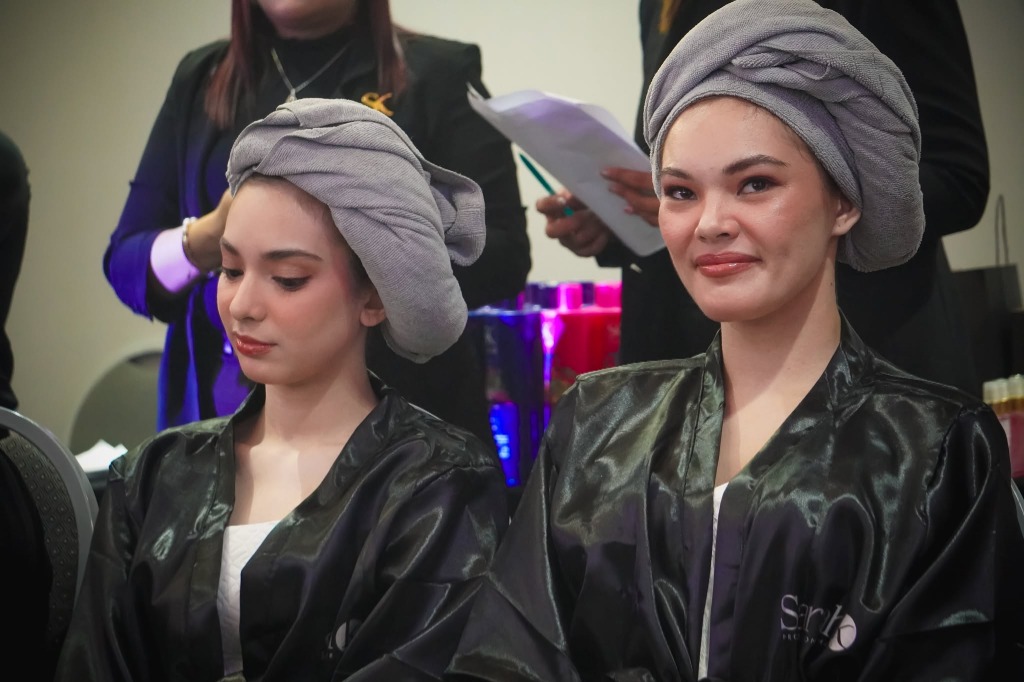 Hair models prepared for live demonstration