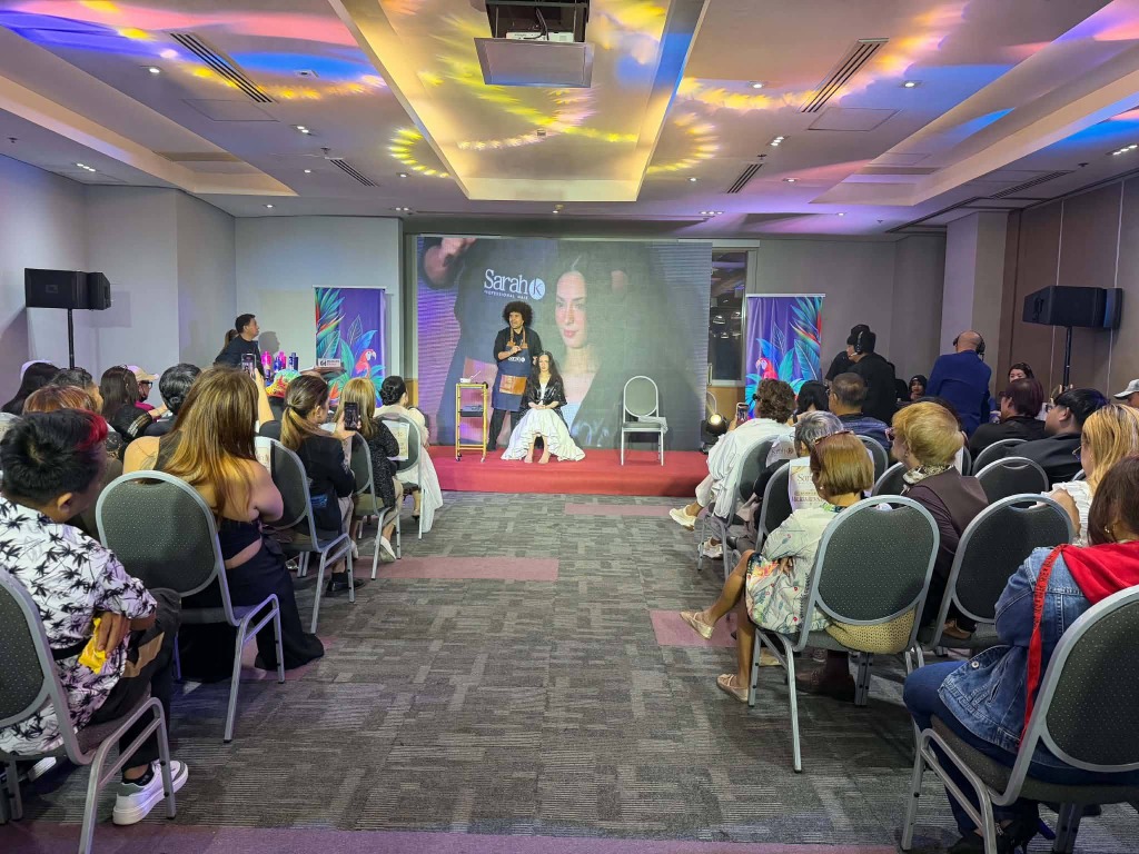 Live hair treatment demonstration on stage